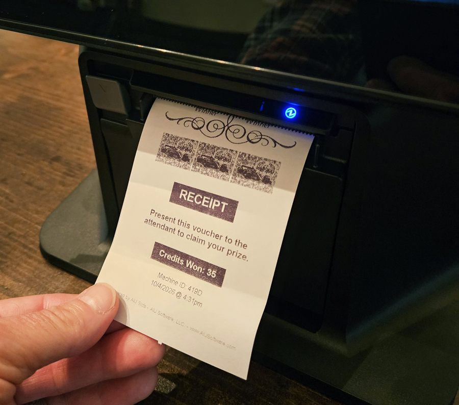 Prize voucher printing from the optional built-in receipt printer on the trade show slot machine rental kiosk